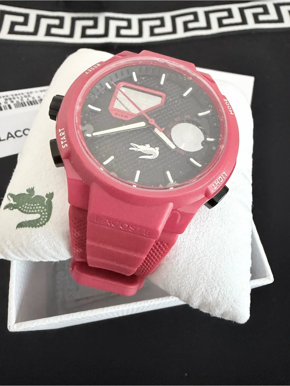 Brand new Lacoste Unisex Analog & Digital Watch in red with black dial.